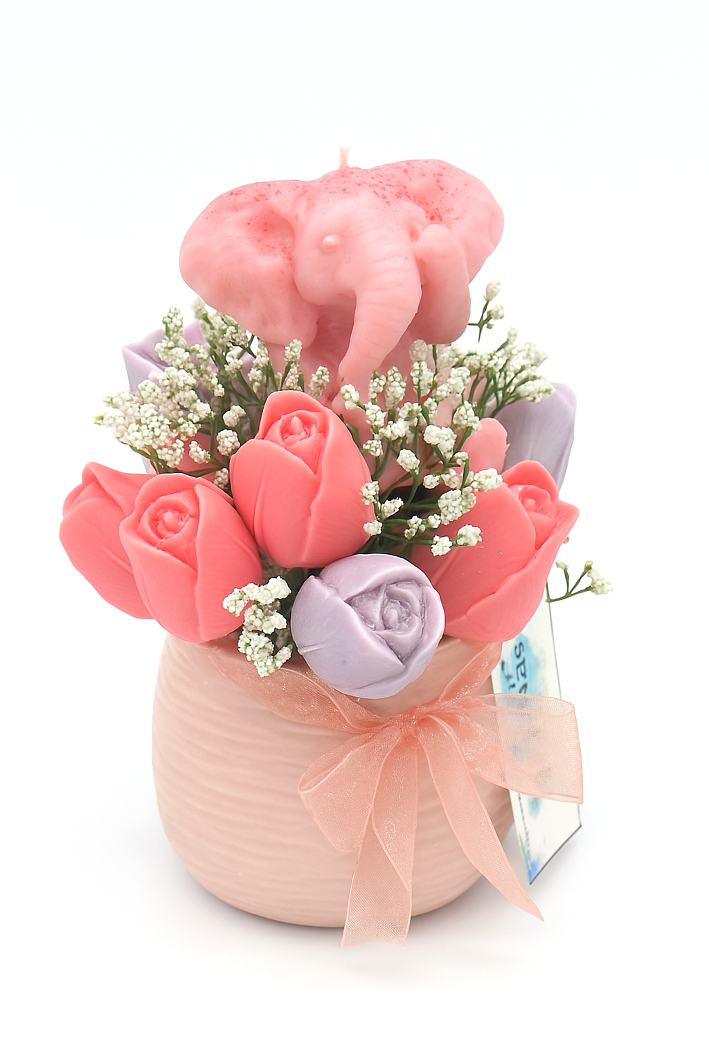 Handmade tulip candle flower bouquet with pink and purple wax flowers, baby elephant candle, in a decorative pink vase with ribbon and white floral accents