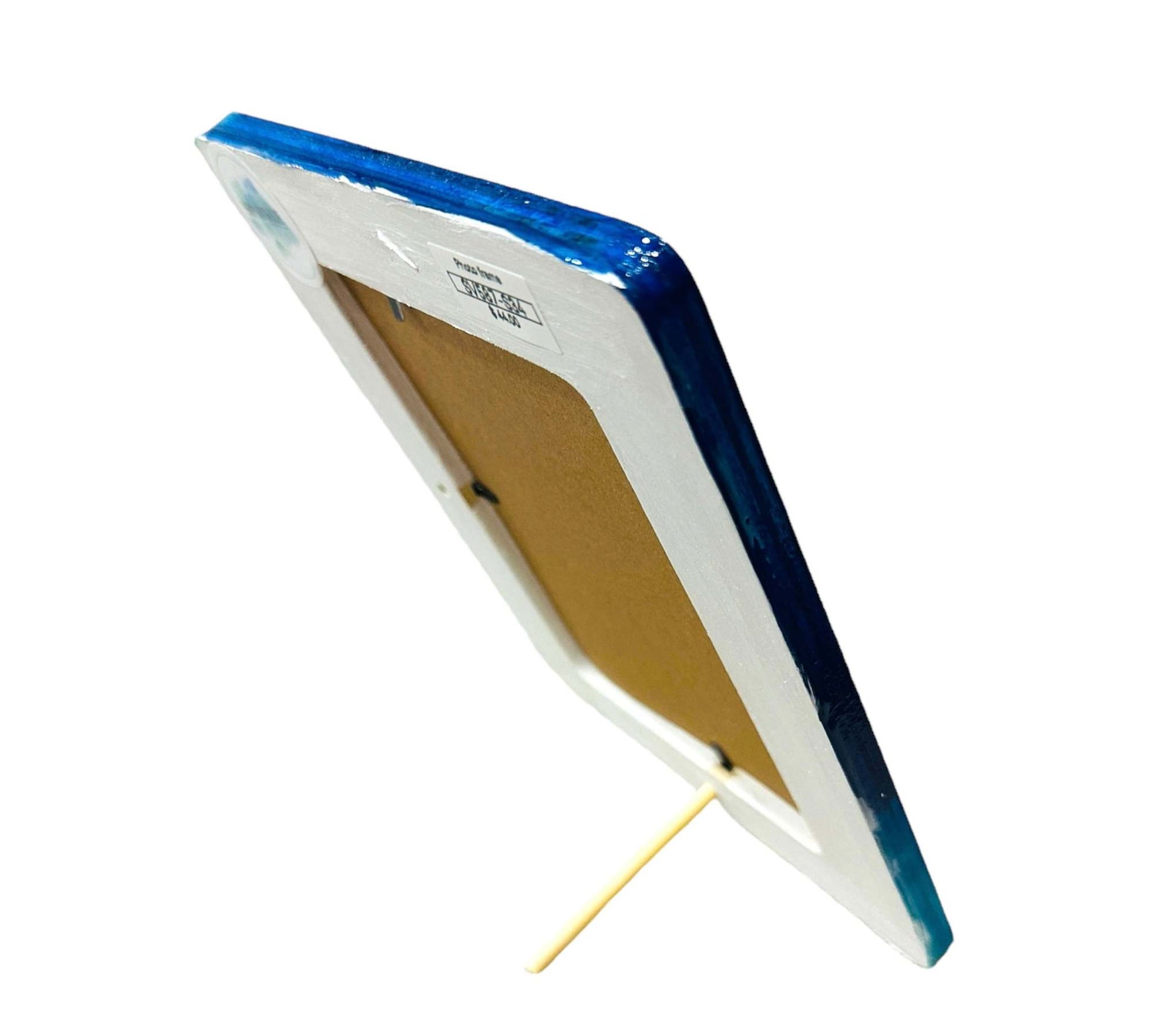 Ocean wave photo frame with blue resin edges and a stand on the back.