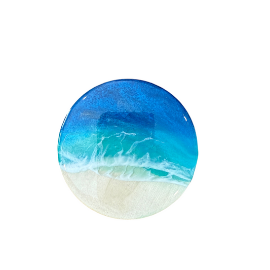 Handcrafted resin ocean coaster with realistic beach wave design and sandy shore details