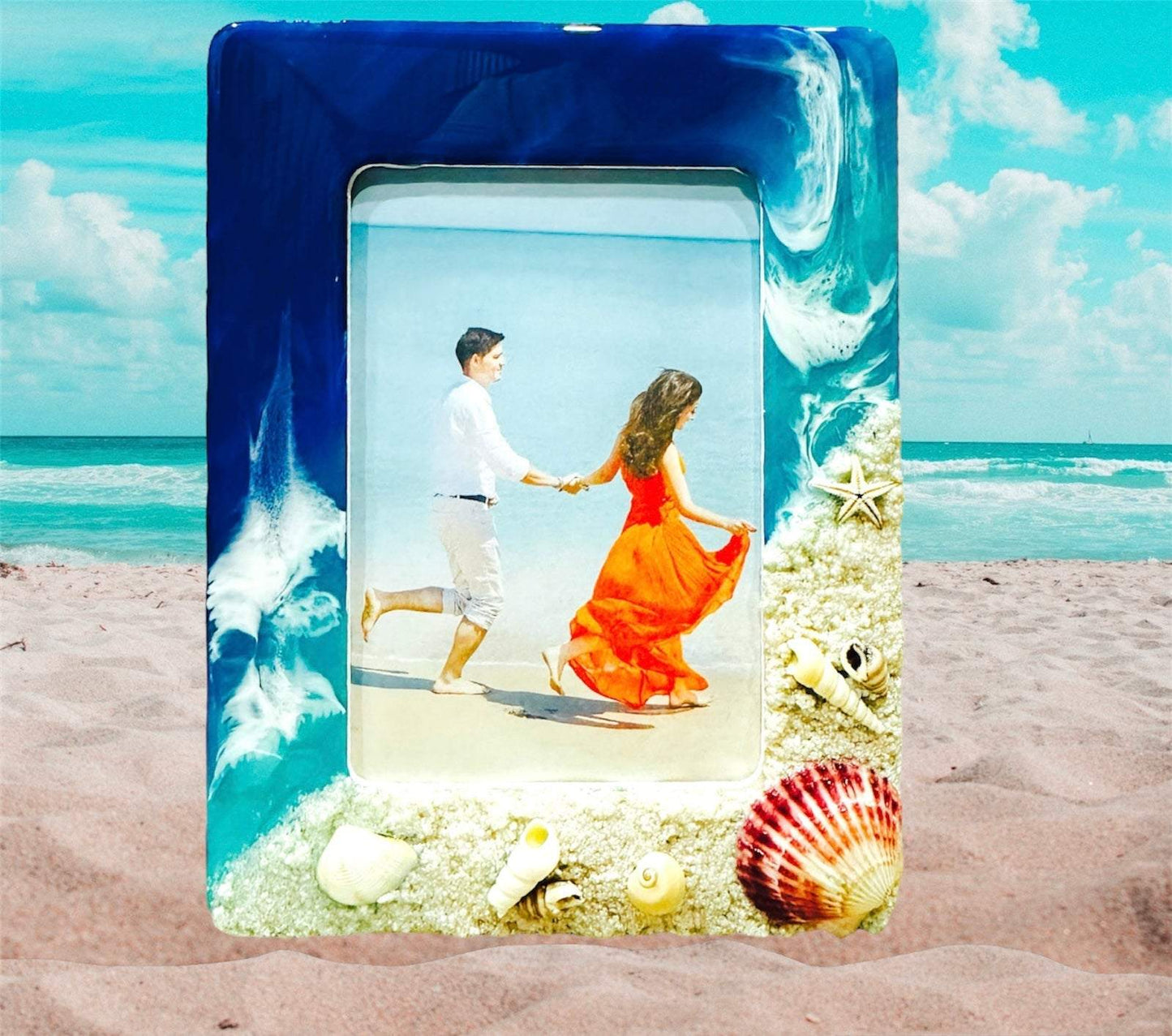 Ocean wave photo frame with shells and starfish decor, featuring blue and white resin waves.