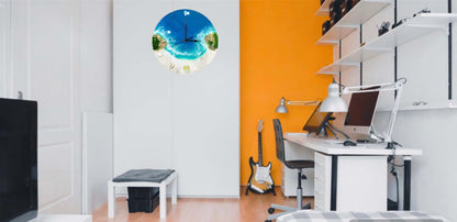 Round resin ocean wall clock featuring an island, turquoise waves, sand, seashells, and miniature boat decor.