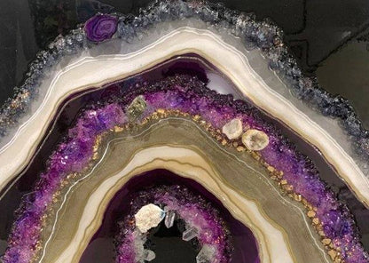 Handmade crystal geode wall art featuring purple amethyst, pyrite quartz, and angel crystals with natural geode textures for spiritual home decor
