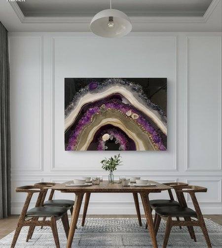 Elegant crystal geode wall art featuring purple, gold, and clear quartz with metallic accents in a modern dining room setting