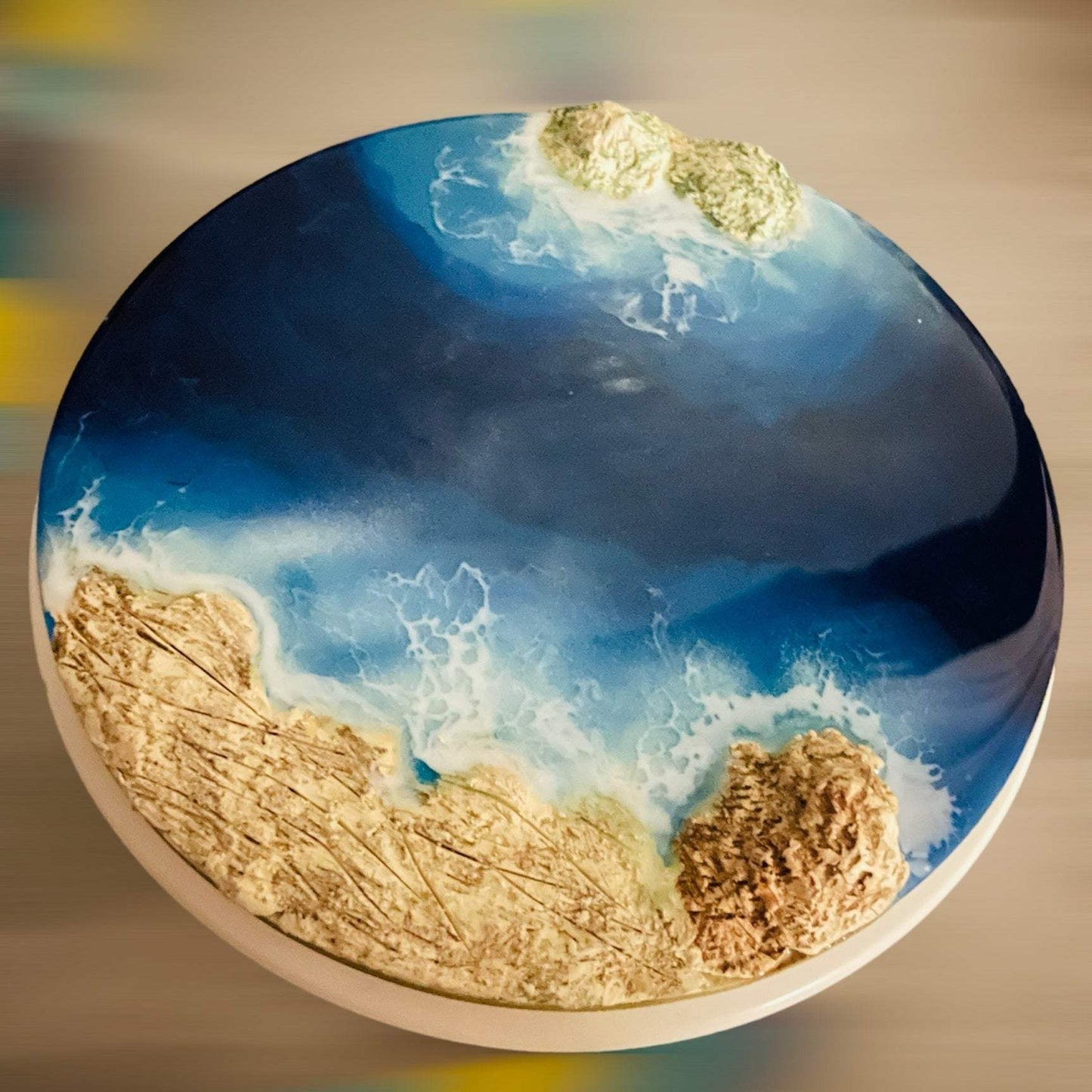 Round 8-inch ocean art resin decor with sand and rock effects and glossy beach-inspired finish