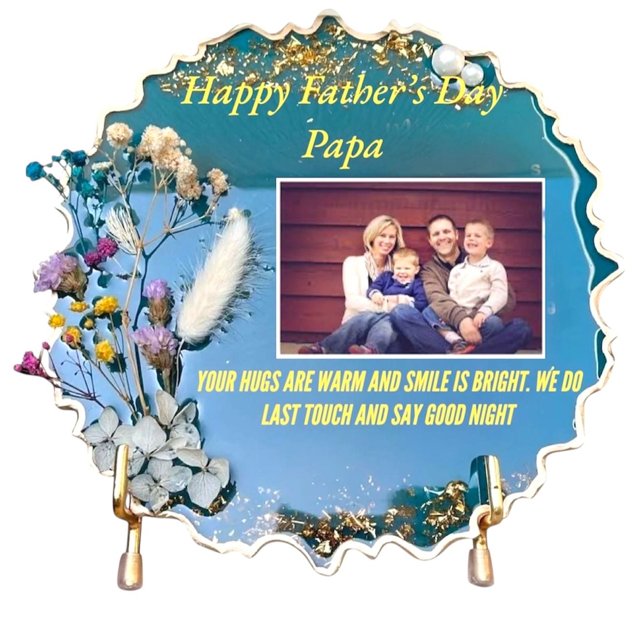 Custom pressed flower frame with blue resin base, gold edges, dried flowers, personalized Father's Day message, and family photo.