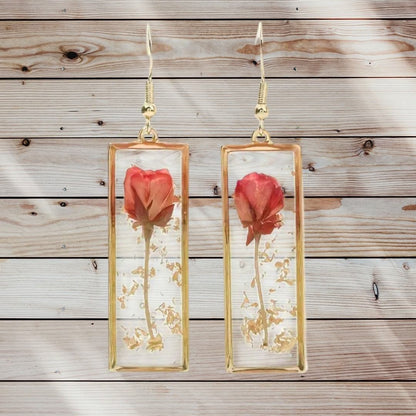 Handcrafted rectangle earrings with real dried rose petals encased in clear resin and gold-toned frames
