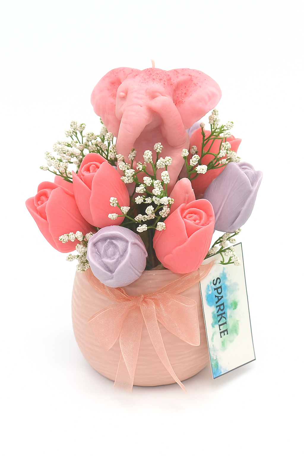 Handmade tulip candle flower bouquet with pink and lavender candle flowers, a pink elephant-shaped candle, white baby's breath, in a pink vase with satin ribbon decoration