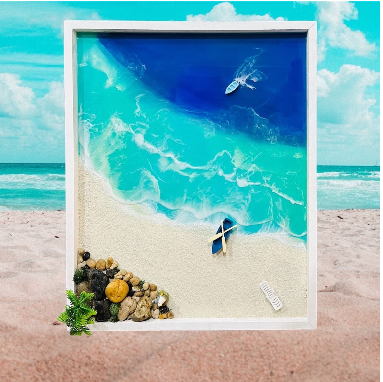 3D ocean wall art with resin waves, sandy beach, miniature boat, and shells in coastal home decor style